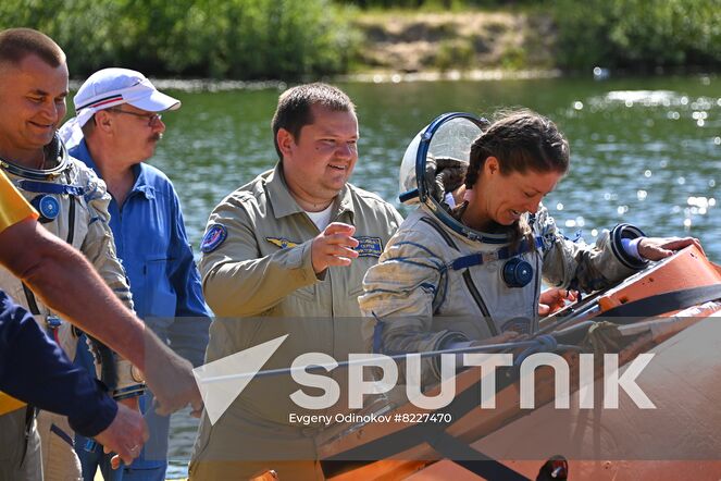 NASA astronaut Tracy Caldwell Dyson, crew member of the 70th expedition to the International Space Station, practices an emergency landing in water at Russia's Emergency Ministry base in Noginsk, Moscow region, Russia. Location: Russia, Moscow region. Author: Evgeny Odinokov/Sputnik. Russia Space
