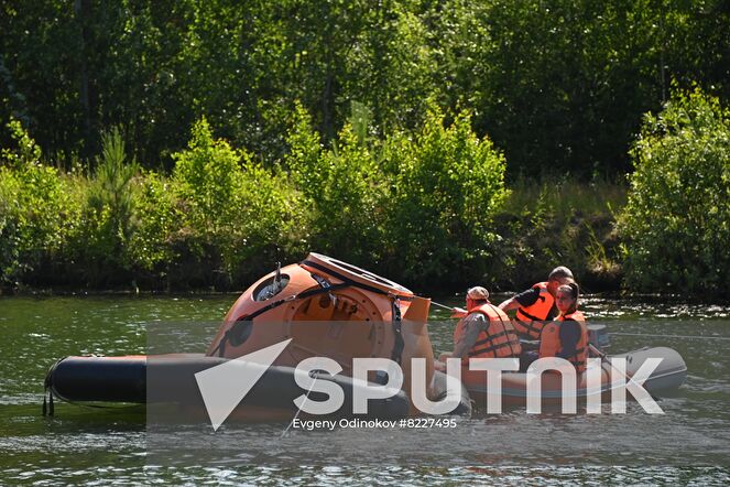 Russian cosmonauts Alexey Ovchinin and Oleg Platonov and NASA astronaut Tracy Caldwell Dyson, crew members of the 70th expedition to the International Space Station, practice an emergency landing in water at Russia's Emergency Ministry base in Noginsk, Moscow region, Russia. Location: Russia, Moscow region. Author: Evgeny Odinokov/Sputnik. Russia Space