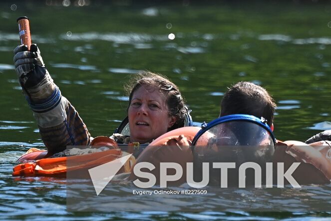 NASA astronaut Tracy Caldwell Dyson, crew member of the 70th expedition to the International Space Station, practices an emergency landing in water at Russia's Emergency Ministry base in Noginsk, Moscow region, Russia. Location: Russia, Moscow region. Author: Evgeny Odinokov/Sputnik. Russia Space