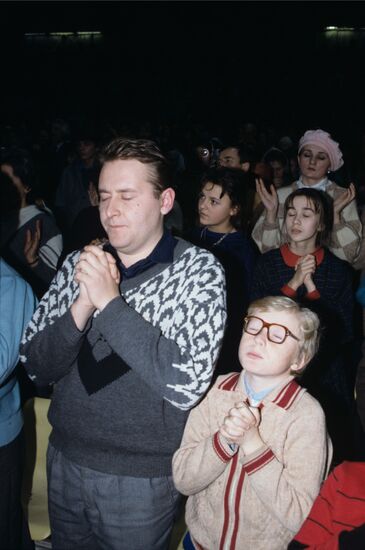Pastor Wolfgang Wegert conducts mass sermon
