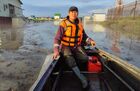 In this handout video grab released by the Russian Investigative Commettee, a Member of Russian Emergencies Ministry is seen during evacuation of local residents from flooded houses to a safer place, in the village of Betenkes in Yakutia, Russia. Editorial use only, no archive, no commercial use. Location: Russia, Republic of Sakha (Yakutia). Russia Floods