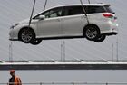 A used car imported from Japan is unloaded from a ship at the commercial port of Vladivostok, Russia. Location: Vladivostok. Author: Vitaliy Ankov/Sputnik. Russia Used Cars Import