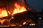 The view shows a fire as a result of a collision between two trucks on the 624th kilometer of the R-255 Siberia federal highway in Bogotol district of Krasnoyarsk region, Russia. There are fatalities. Location: Krasnoyarsk region. Author: Ilya Naymushin/Sputnik. Russia Car Crash