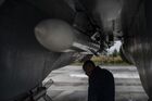A technician inspects a Sukhoi Su-35 fighter jet of the Russian Aerospace Forces at an airfield, in the course of Russia's special military operation in Ukraine, at the unknown location. Ukraine Russia Military Operation Airfield