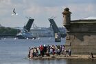 The Buyan-M Veliky Ustyug small missile ship and the BT-115 Pavel Khenov base minesweeper sail along the Neva River during a rehearsal for the Navy Day parade in St. Petersburg, Russia. Location: St. Petersburg. Author: Alexander Galperin/Sputnik. Russia Navy Day Parade Rehearsal
