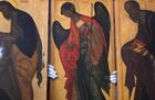 A worker mounts icons after restoration at St. Basil's Cathedral, officially named the Cathedral of the Intercession of the Most Holy Theotokos on the Moat or Prokrovsky Cathedral, in Moscow, Russia. Location: Russia, Moscow. Author: Vladimir Astapkovich. Russia Religion Icons Restoration
