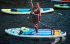 Stand up paddle boarders take part in the 2022 Fontanka-SUP festival in central St Petersburg, Russia. Location: Russia, St. Petersburg. Author: Alexei Danichev/Sputnik. Russia SUP Boarding Festival