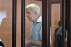 Grigory Kostusev is seen inside a defendants cage before a court hearing, in Minsk, Belarus. Nine people are being accused in the criminal probe launched in Belarus into the failed coup and the assassination plot against President Alexander Lukashenko. These are Alexander Feduta, Yury Zenkovich, Grigory Kostusev, Olga Golubovich, Dmitry Shchigelsky, Alexander Perepechko, Pavel Kulazhenko, Vitaly Makarenko and Igor Makar. Location: Belarus, Minsk. Author: Viktor Tolochko/Sputnik/РИА Новости. Belarus Plotted Coup Defendants Trial