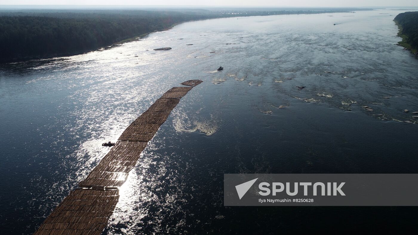Log rafts drift down Angara River