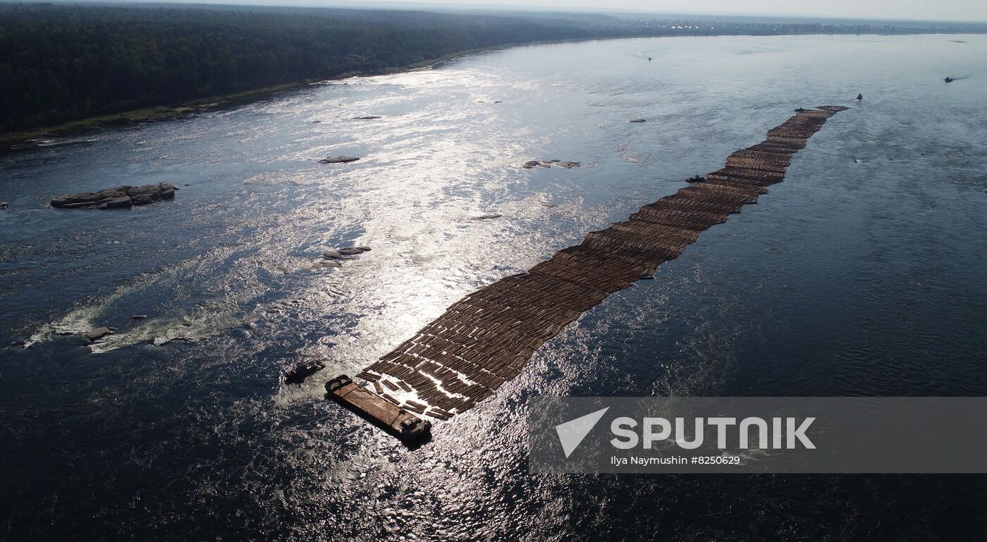 Log rafts drift down Angara River