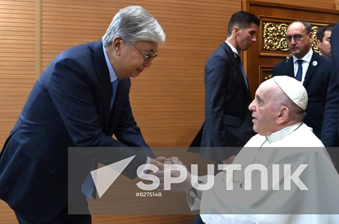 In this handout photo released by the Kazakh Presidential Press Office, Kazakh President Kassym-Jomart Tokayev and Pope Francis attend a farewell ceremony at an airport, in Nur-Sultan, Kazakhstan. Pope Francis arrived on September 13 in Kazakhstan's capital for a three-day visit to take part in the 7th Congress of Leaders of World and Traditional Religions. Editorial use only, no archive, no commercial use. Location: Kazakhstan, Nur-Sultan. Kazakhstan Religion Pope