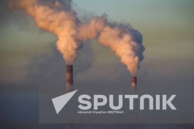 The pipes of the thermal power plant No 2 are seen in the morning fog in Novosibirsk, Russia. Location: Russia, Novosibirsk. Author: Alexandr Kryazhev/Sputnik. Russia Weather