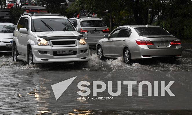 Cars ride on the road during the rain in Vladivostok, Russia. Due to the lack of storm sewers, the roads are flooded with water. Location: Russia, Vladivostok. Author: Vitaliy Ankov/Sputnik. Russia Weather