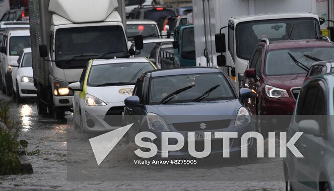 Cars ride on the road during the rain in Vladivostok, Russia. Due to the lack of storm sewers, the roads are flooded with water. Location: Russia, Vladivostok. Author: Vitaliy Ankov/Sputnik. Russia Weather