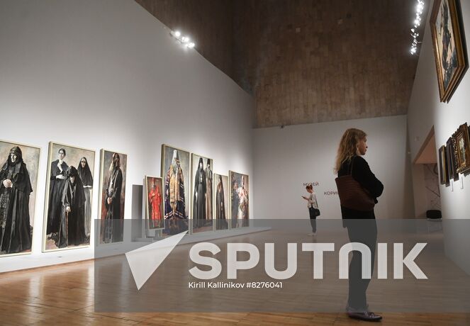 A visitor looks at the paintings at the exhibition "My Tretyakov Gallery. From Virtuality to Reality" in the New Tretyakov Gallery on Krymsky Val street in Moscow, Russia. The new exhibition project combines the display of works of art and a demonstration of the capabilities of a digital platform that allowes you to get acquainted with the museum's funds online. At the moment, there are more than 4 thousand works of art stored in the Tretyakov Gallery in the public domain. Location: Russia, Moscow. Author: Kirill Kallinikov/Sputnik. Russia Art Tretyakov Gallery Collection