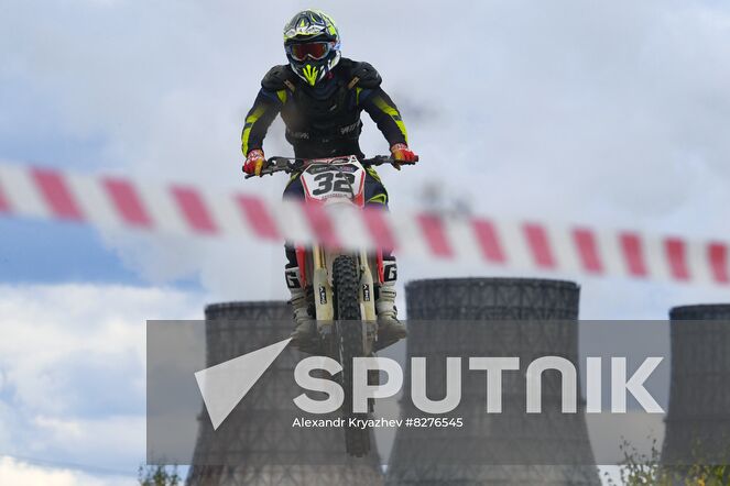 A participant makes a jump on a motorcycle during the Novosibirsk Region Motocross Championship in Novosibirsk, Russia. Location: Russia, Novosibirsk. Author: Alexandr Kryazhev/Sputnik. Russia Motocross Competition