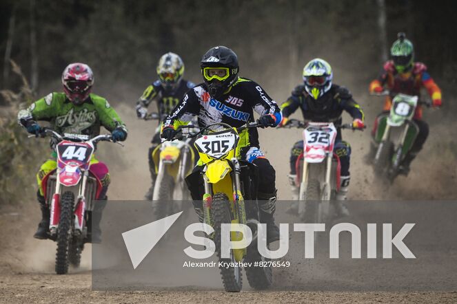 Motorcycle riders compete during the Novosibirsk Region Motocross Championship in Novosibirsk, Russia. Location: Russia, Novosibirsk. Author: Alexandr Kryazhev/Sputnik. Russia Motocross Competition