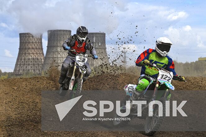Motorcycle riders compete during the Novosibirsk Region Motocross Championship in Novosibirsk, Russia. Location: Russia, Novosibirsk. Author: Alexandr Kryazhev/Sputnik. Russia Motocross Competition