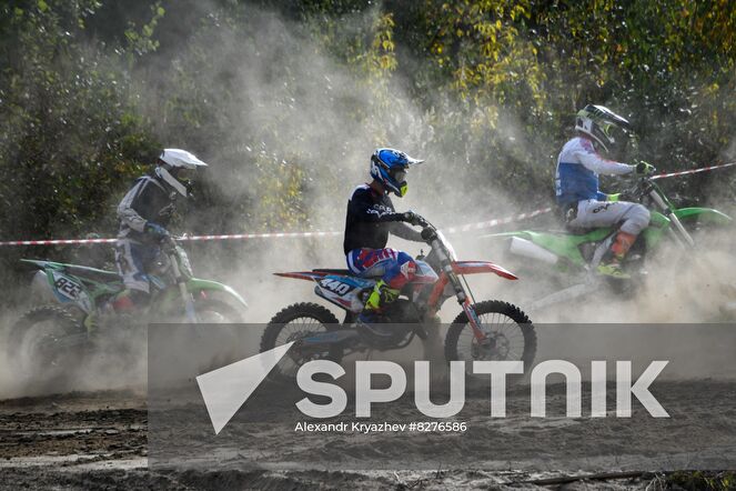 Motorcycle riders compete during the Novosibirsk Region Motocross Championship in Novosibirsk, Russia. Location: Russia, Novosibirsk. Author: Alexandr Kryazhev/Sputnik. Russia Motocross Competition