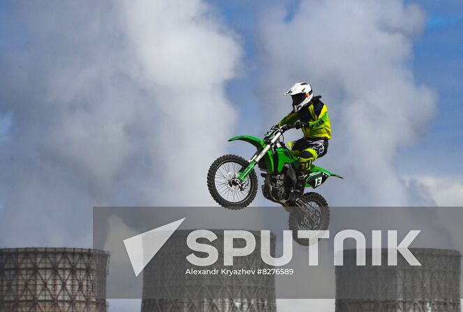A participant makes a jump on a motorcycle during the Novosibirsk Region Motocross Championship in Novosibirsk, Russia. Location: Russia, Novosibirsk. Author: Alexandr Kryazhev/Sputnik. Russia Motocross Competition