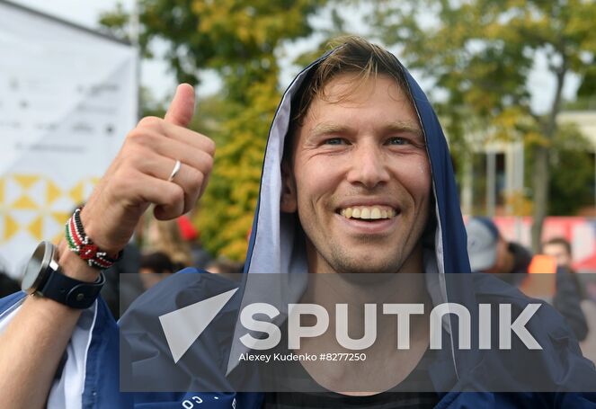 Russian athlete Iskander Yadgarov reacts after winning the Moscow marathon, in Moscow, Russia. Location: Russia, Moscow. Author: Alexey Kudenko/Sputnik. Russia Moscow Marathon