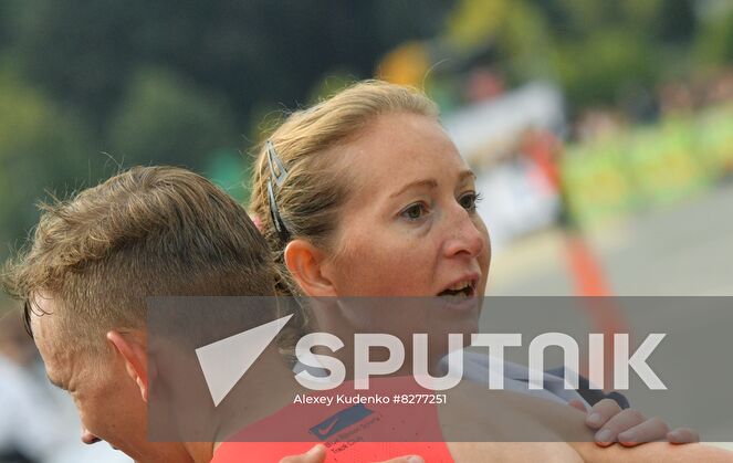 Russian athlete Marina Kovaleva reacts after finishing the Moscow marathon, in Moscow, Russia. Location: Russia, Moscow. Author: Alexey Kudenko/Sputnik. Russia Moscow Marathon