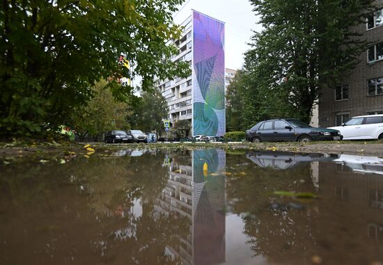 Murals on facades of residential builings in Balashikha
