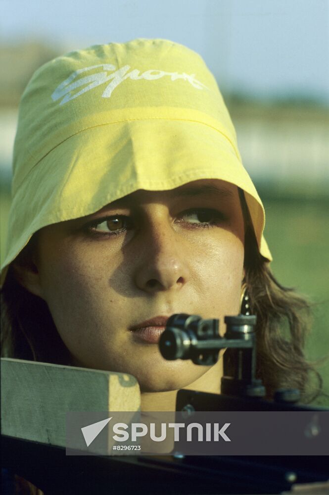 Young woman with cross bow