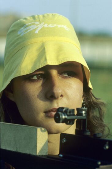 Young woman with cross bow
