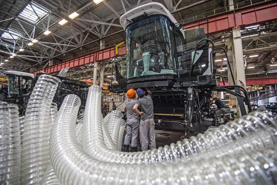 Assembling farming machine at main Rostselmash Co. assembly line