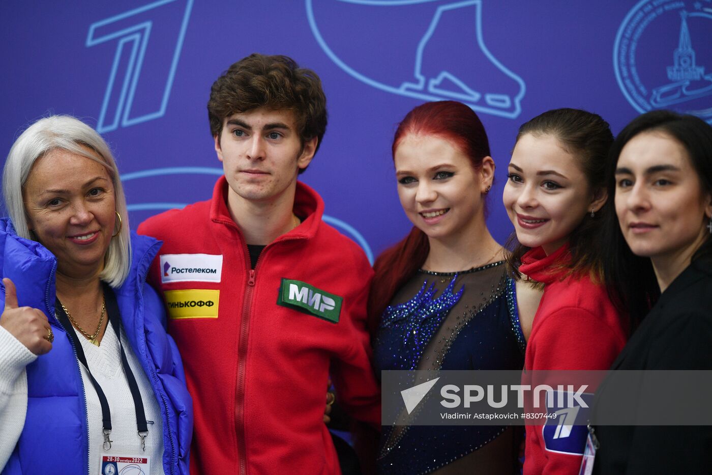 Coach Svetlana Sokolovskaya, Mark Kondratyuk, Alexandra Trusova and Sofia Samodelkina pose for a photo before the award ceremony at the "Grand Prix of Russia - Velvet Season" event, the 2nd stage of Russian Figure Skating Cup, at the Iceberg Ice Sports Palace in Sochi, Russia. Location: Russia, Sochi. Author: Vladimir Astapkovich/Sputnik. Russia Figure Skating Grand Prix Awarding