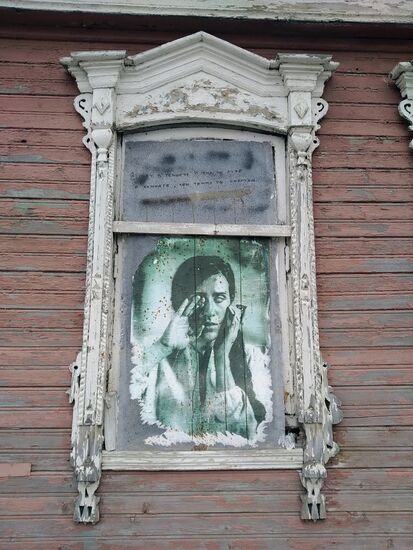 Boarded up windows of private house in Kolomna