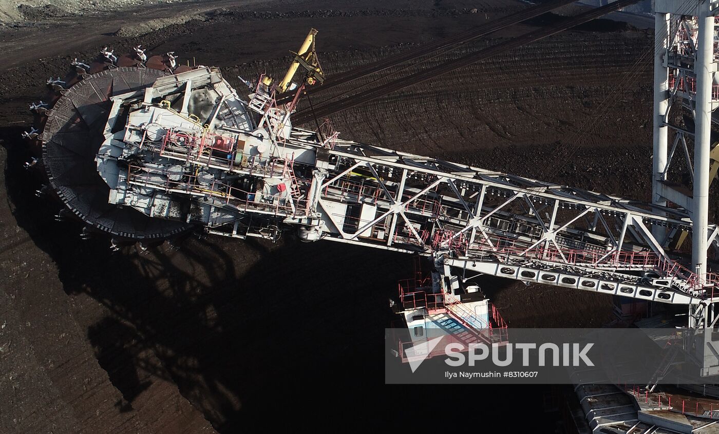 The biggest in Russia bucket wheel mining excavator is seen at the Berezovsky coal mine of the Siberian Coal Energy Company (SUEK) in Krasnoyarsk region, Russia. The excavator capacity is 5250 cubic meters of coal per hour. The excavator is used for coal mining at night to save electricity, and during the day it is serviced and repaired. Location: Russia, Krasnoyarsk region. Author: Ilya Naymushin/Sputnik. Russia Coal Mining