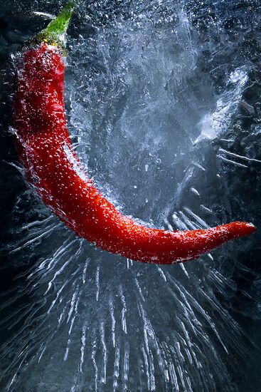 High-resolution photos of pepper frozen in water