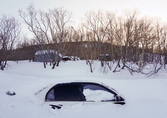 Snow-covered vehicle in Petropavlovsk-Kamchatsky