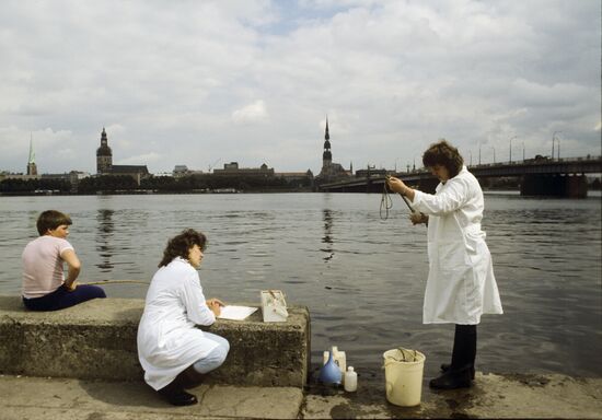 Protecting Baltic Sea. Taking sanitary-epidemiological water samples from Daugava River