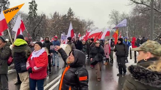 Several hundred people took part in a protest in Warsaw against Poland's involvement in hostilities in Ukraine