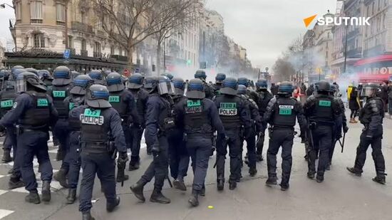 French police use tear gas during protest against pension reform in Paris