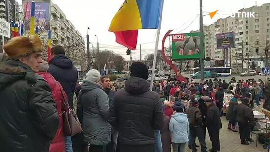 People gathering in Chisinau to protest an increase in energy bills