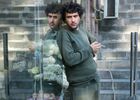 A flower seller smokes near the stall on Mesrop Mashtots Avenue, in Yerevan, Armenia. Location: Armenia, Yerevan. Author: Grigory Sysoev/Sputnik. Armenia Daily Life