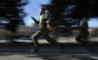 Servicemen take part in a military triathlon championship held by the Russian Black Sea Fleet, at Metallist Stadium, in Sevastopol, Crimea, Russia. The competition consists of 60m, 100m, 1000m and 3000m races, pull-ups and an obstacle course. Location: Russia, Sevastopol. Author: Konstantin Mihalchevskiy. Russia Navy Triathlon Championship