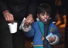 A refugee boy is seen at the Bruzgi logistics centre providing accommodation to migrants near the Bruzgi-Kuznica Bialostocka border crossing at the Belarusian-Polish border in Grodno region, Belarus. Migrants from the Middle East and North Africa trapped in Belarus have converged on the border with Poland, where razor wire fences and Polish troops have repeatedly blocked their entry. Location: Belarus, Grodno Region. Author: Pavel Bednyakov/Sputnik. Belarus Poland Border Refugees