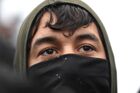 A refugee is seen at the Bruzgi logistics centre providing accommodation to migrants near the Bruzgi-Kuznica Bialostocka border crossing at the Belarusian-Polish border in Grodno region, Belarus. Migrants from the Middle East and North Africa trapped in Belarus have converged on the border with Poland, where razor wire fences and Polish troops have repeatedly blocked their entry. Location: Belarus, Grodno Region. Author: Pavel Bednyakov/Sputnik. Belarus Poland Border Refugees