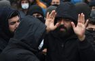 Refugees are seen at the Bruzgi logistics centre providing accommodation to migrants near the Bruzgi-Kuznica Bialostocka border crossing at the Belarusian-Polish border in Grodno region, Belarus. Migrants from the Middle East and North Africa trapped in Belarus have converged on the border with Poland, where razor wire fences and Polish troops have repeatedly blocked their entry. Location: Belarus, Grodno Region. Author: Pavel Bednyakov/Sputnik. Belarus Poland Border Refugees