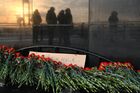 Flowers are placed by people to pay tribute to victims of an accident at the Listvyazhnaya coal mine at the Monument in Memory of Kuzbass Miners in Kemerovo, Russia. A gas leak in the coal mine in Kemerovo region killed over 50 people on November 25. Location: Kemerovo. Author: Alexander Patrin/Sputnik. Russia Coal Mine Accident Victims Mourning