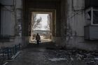 A resident walks near a residential building damaged as a result of shelling in Rubezhnoye, Luhansk People's Republic. Location: Luhansk People's Republic, Rubezhnoe. Author: Valery Melnikov/Sputnik. DPR LPR Russia Ukraine Military Operation