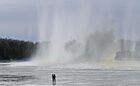 Explosives experts blow up ice in order to prevent flooding of industrial enterprises and residential areas during the spring flood, on the Kan River in Zelenogorsk, Krasnoyarsk region, Russia. Location: Krasnoyarsk region, Zelenogorsk. Author: Ilya Naymushin/Sputnik. Russia Siberia Flood Prevention