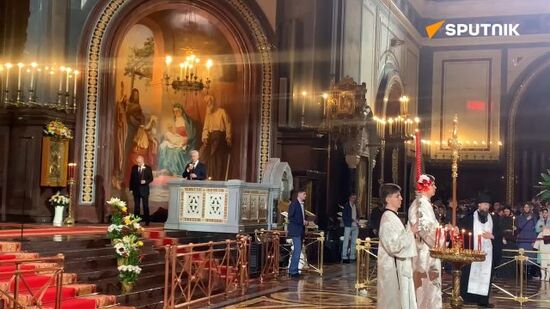 Vladimir Putin and Sergey Sobyanin attend Orthodox Easter service