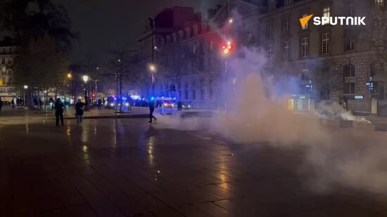 Police use tear gas to disperse protests in Paris city center