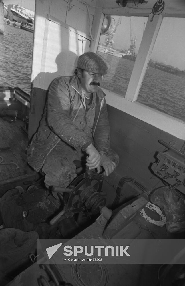 Yury Yegorov, captain of felucca Sadko, out fishing
